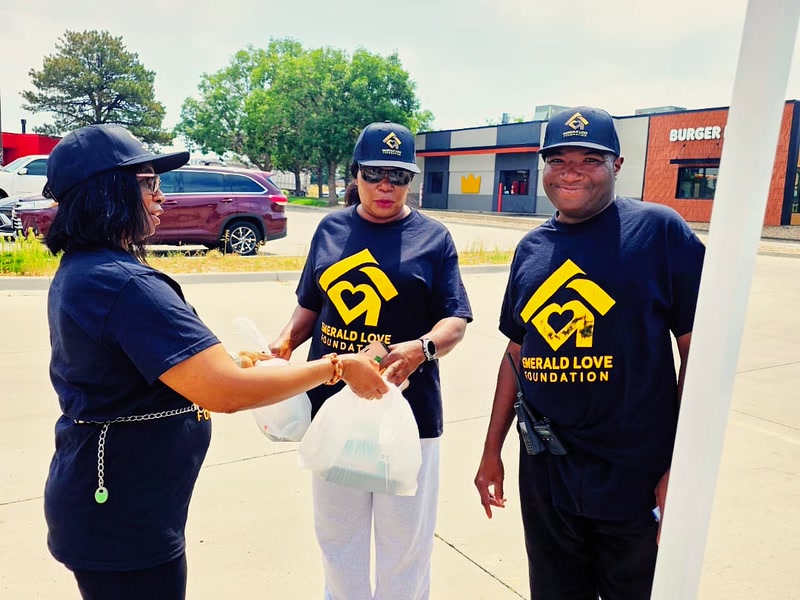 Volunteers handing out care packages to community members